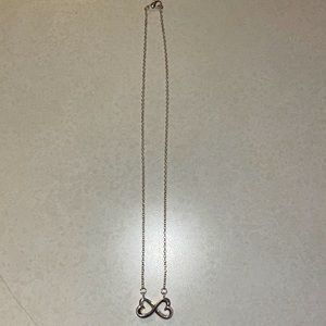 This is a heart infinity necklace in silver!